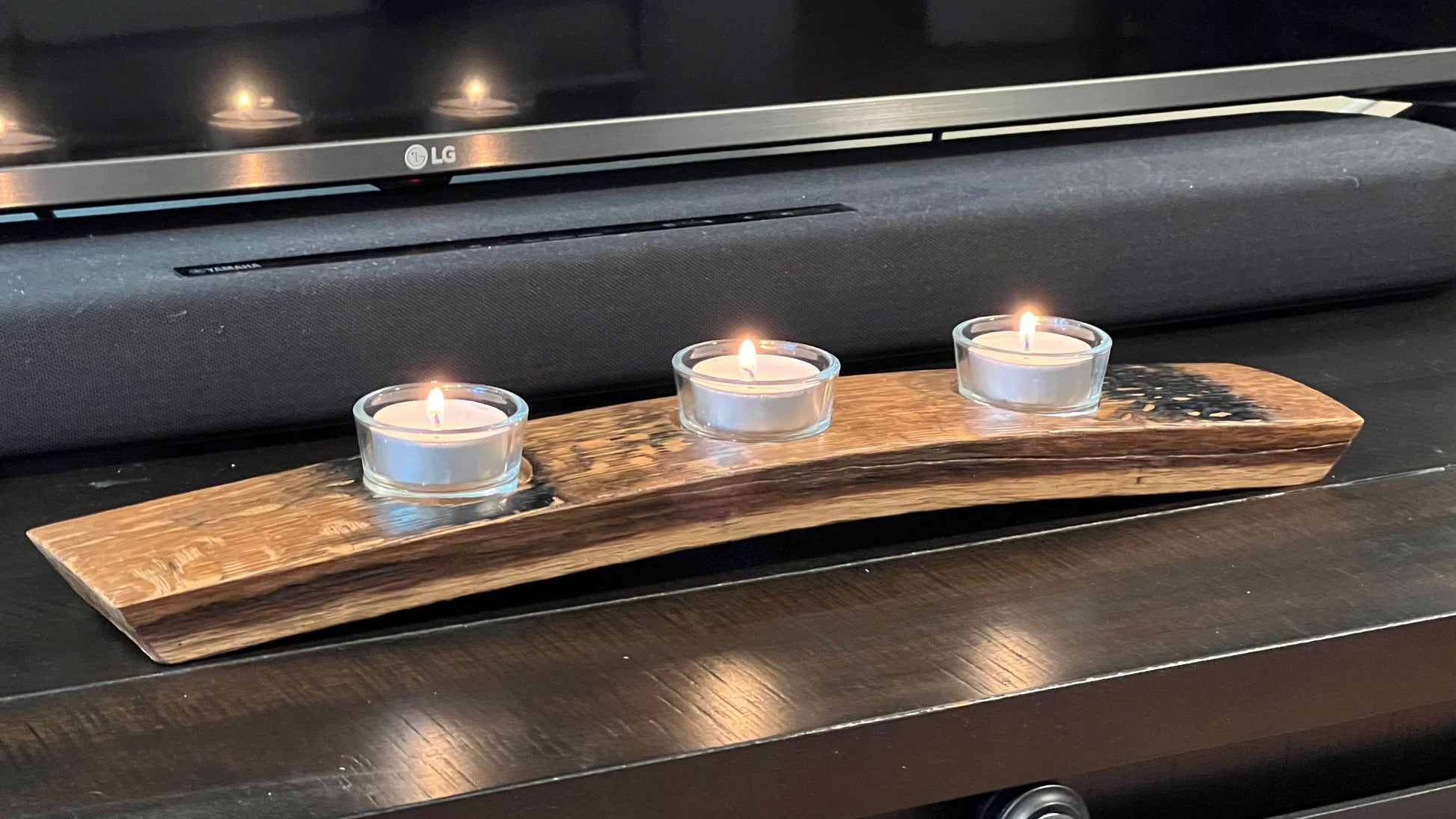 Tea light holder. including tea light glass and tea light, 3 light option. candles lit, displayed in use
