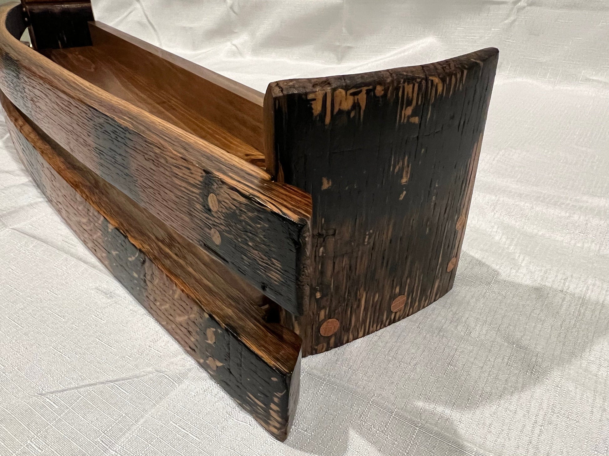 Whiskey barrel stave liquor bottle shelf single tier, outside corner detail