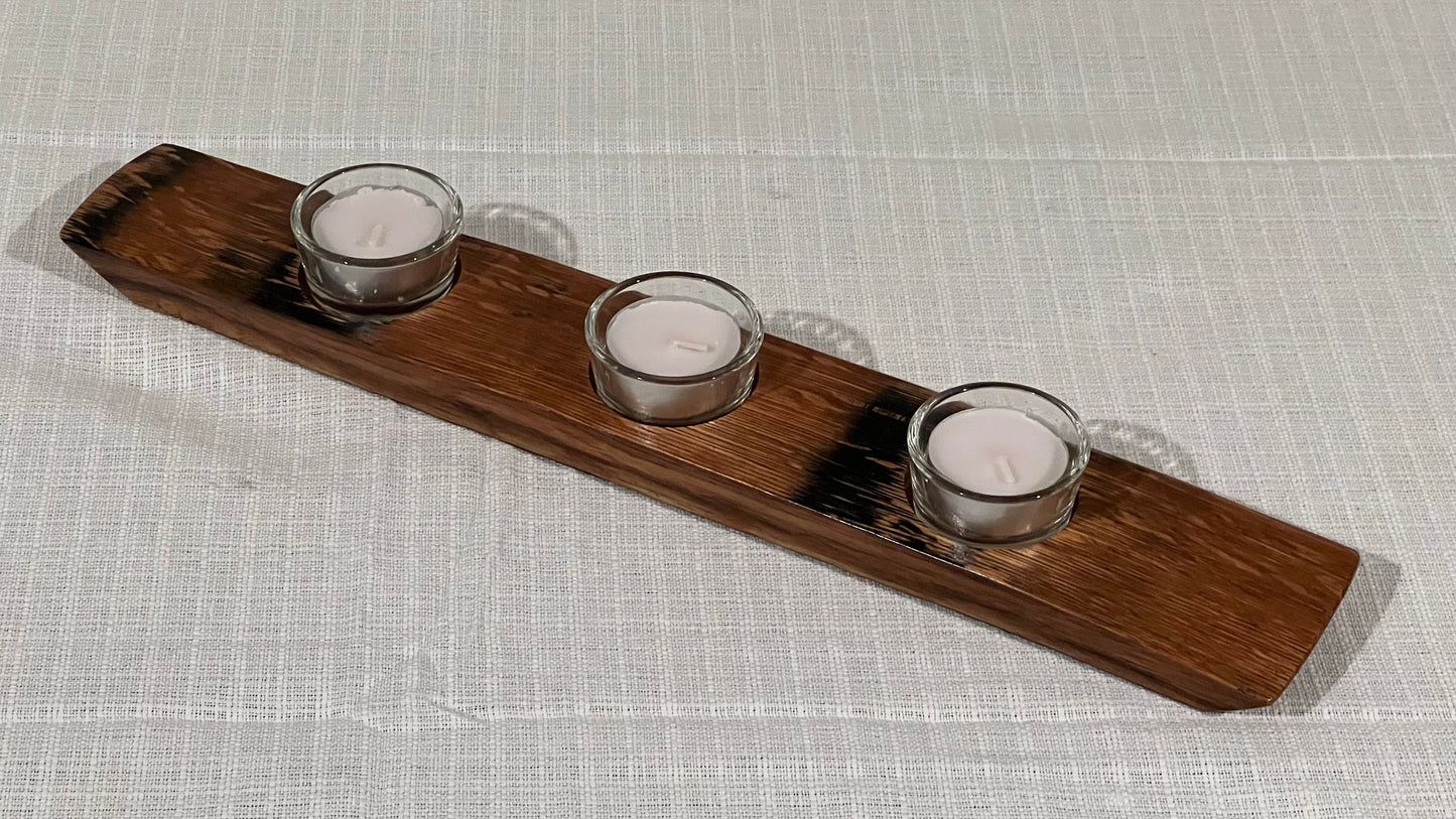 Tea light holder. including tea light glass and tea light, angled view